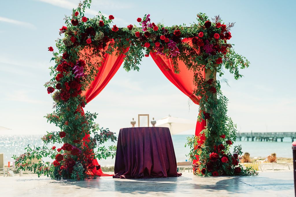 Detail shot of Red Ceremony area with flowers