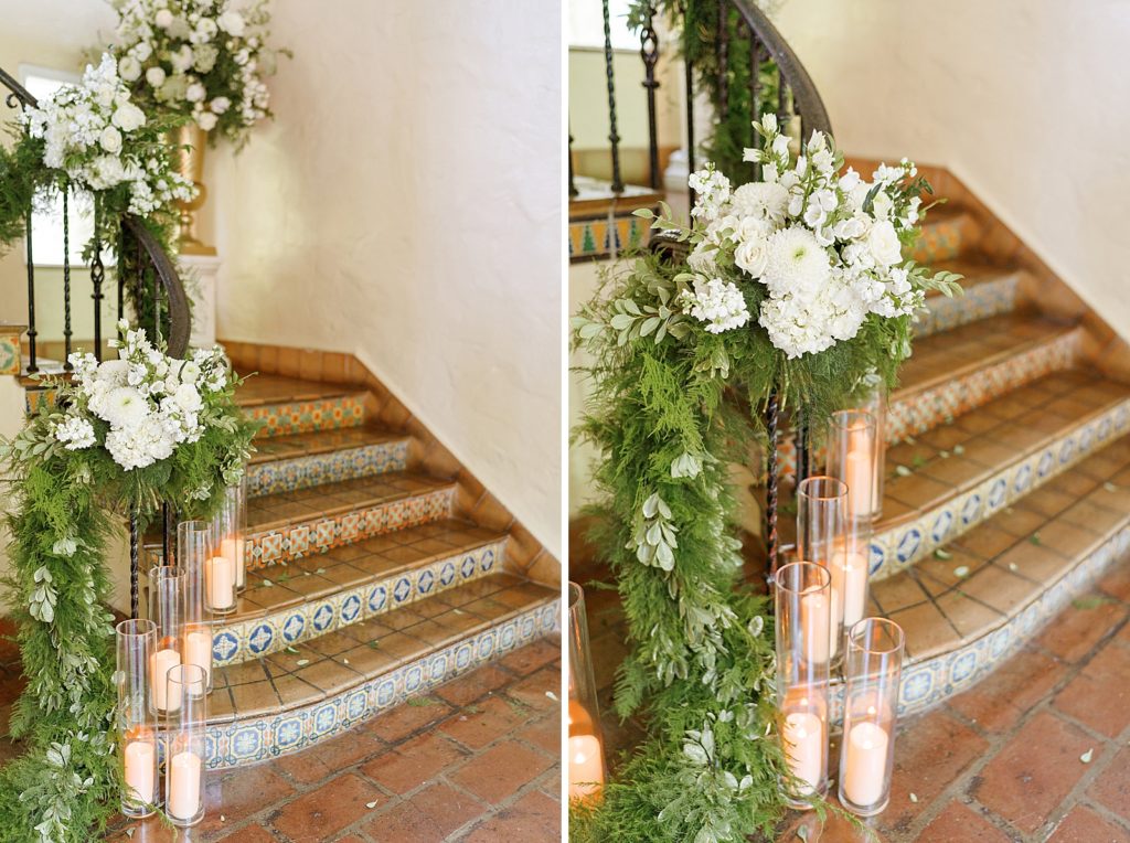 Detail shot of staircase with white flowers on the rails