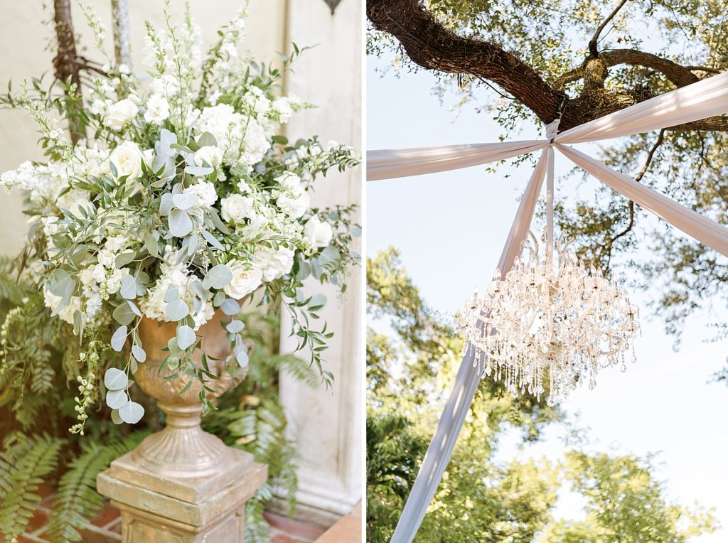Detail shot of White flowers and vintage chandelier on tree branch