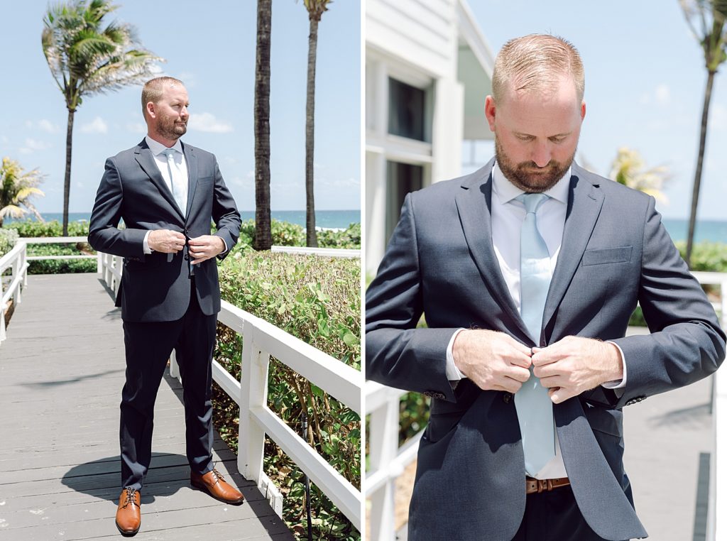 Bride buttoning coat outside by palm trees near the ocean