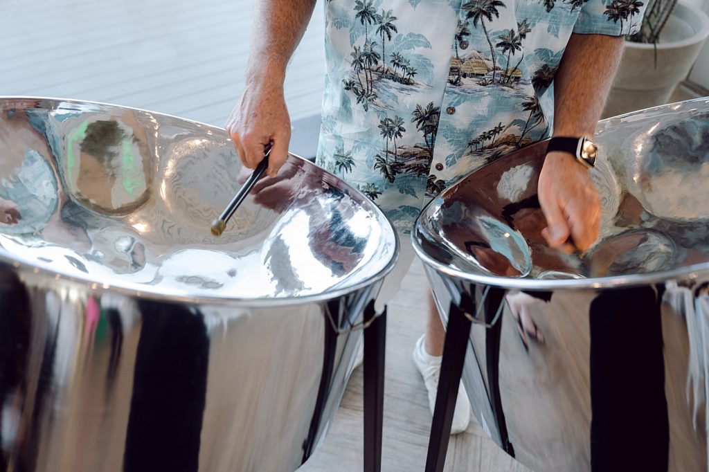 Closeup of musician playing steel drums for Reception